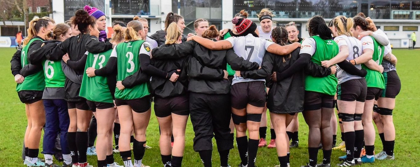 Loughborough Lightning huddle up before playing Sale Sharks.