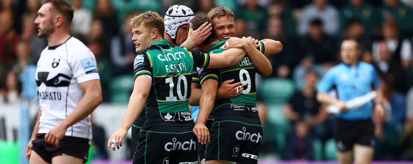 Northampton Saints celebrate scoring a try