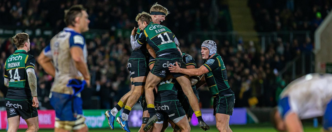 Northampton Saints celebrate scoring a try.