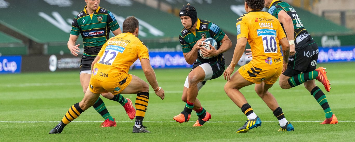 Saints centre Piers Francis carries against Wasps