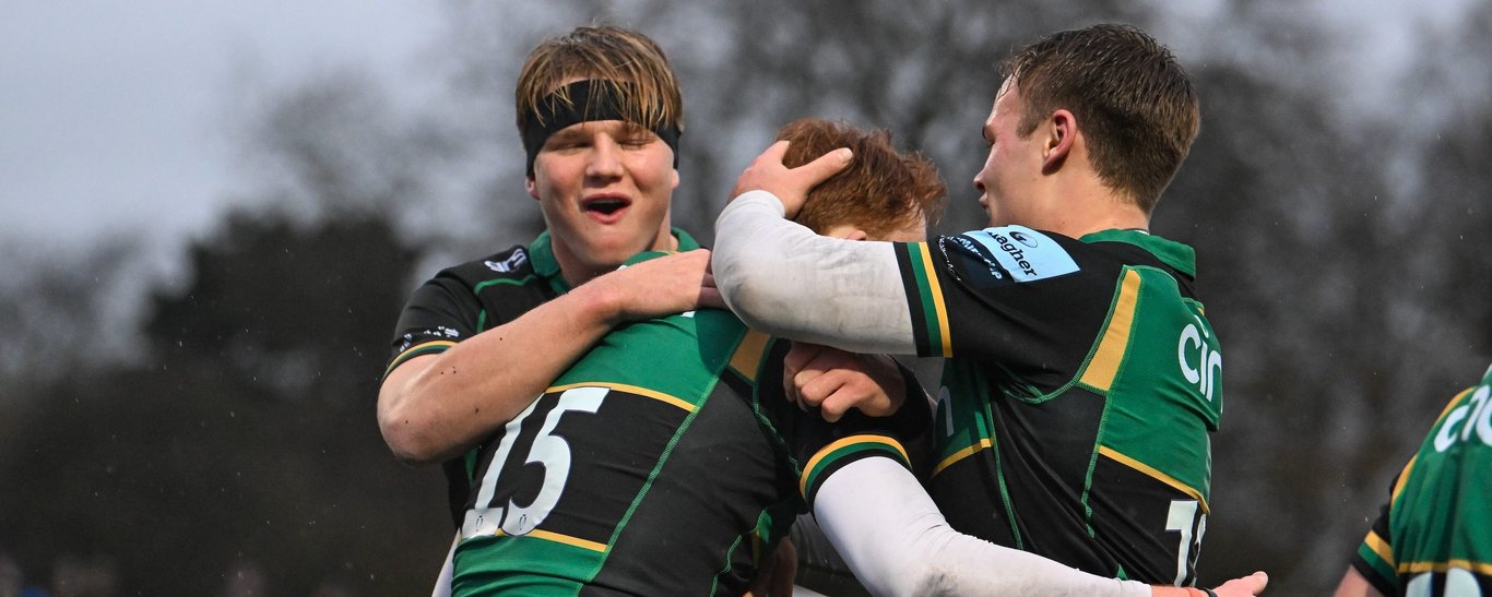 Northampton Saints celebrate scoring a try