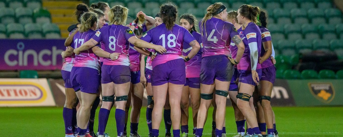 Loughborough Lightning huddle during a game