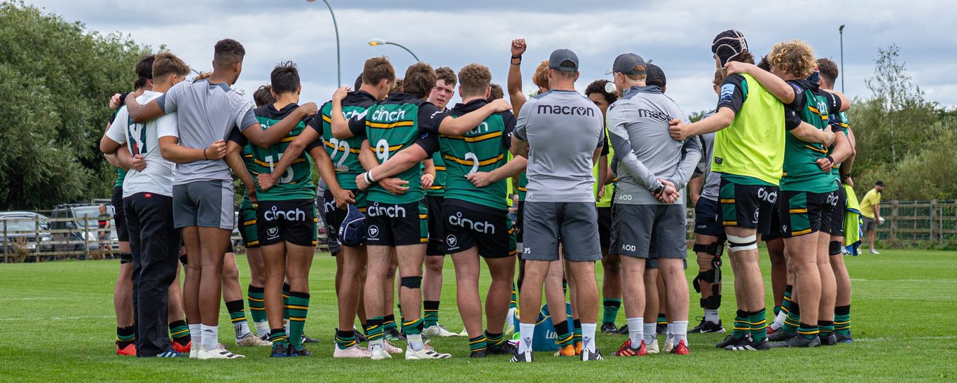 Northampton Saints Under-18s huddle before a game