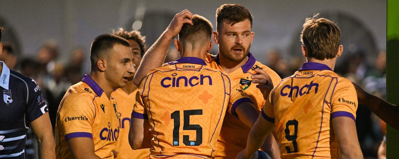 Northampton Saints celebrate scoring a try.