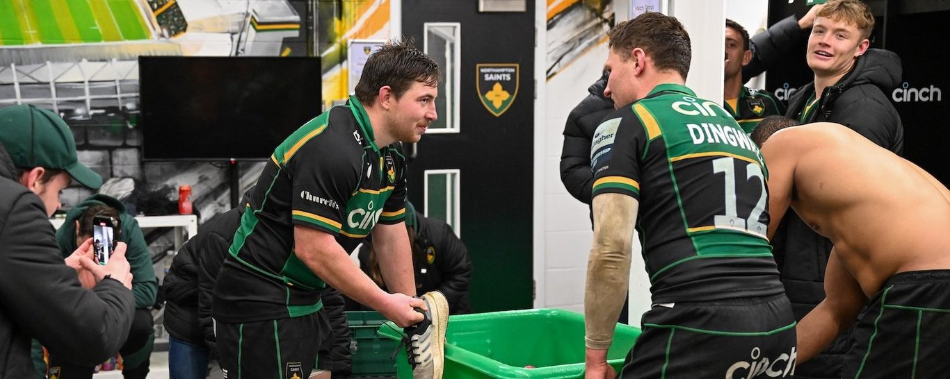 Henry Walker leads the Shoe Army song following his Northampton Saints debut against Newcastle Falcons.