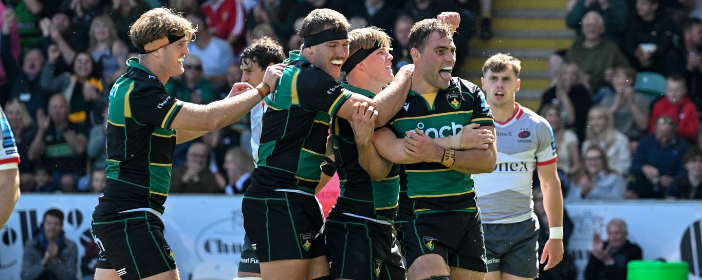 Northampton Saints celebrate scoring a try.