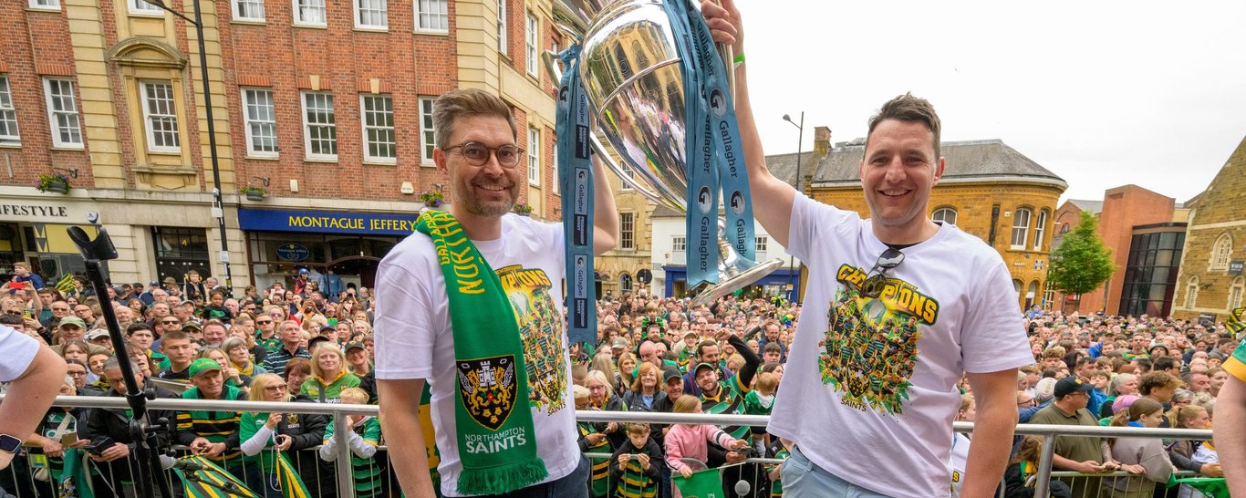 Northampton Saints’ Chief Executive Mark Darbon and Director of Rugby Phil Dowson lift the Gallaher Premiership trophy.