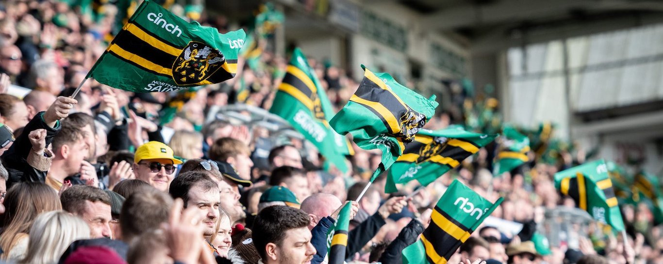 Supporters wave flags at Franklin’s Gardens