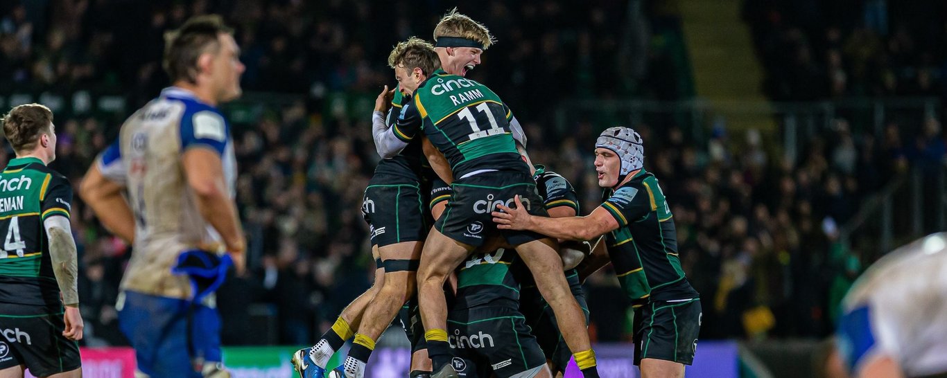 Northampton Saints celebrate scoring a try.