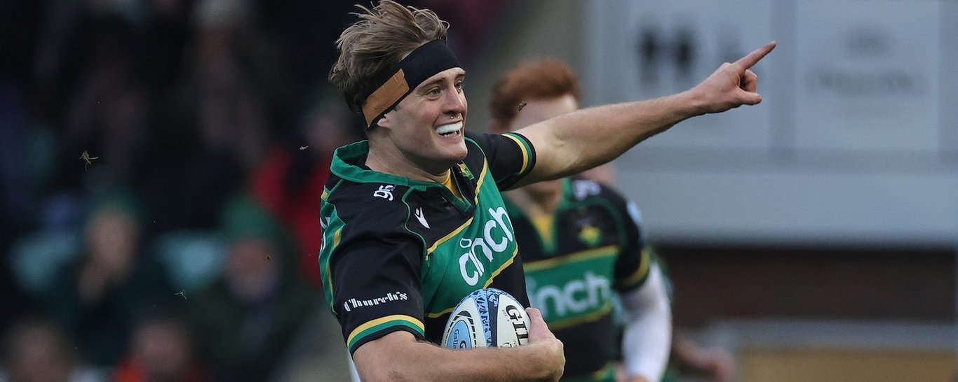 Alex Coles of Northampton Saints scores against Newcastle Falcons.