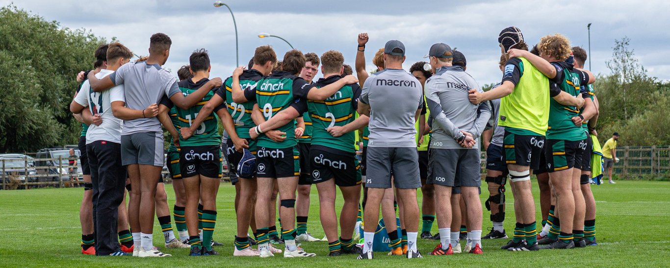 Northampton Saints Under-18s huddle before a game