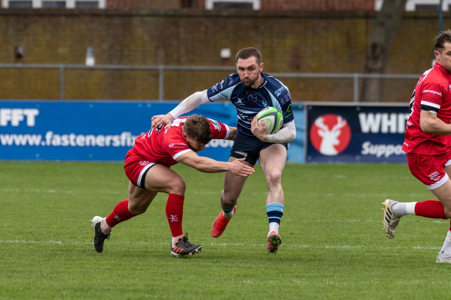 Bedford Blues' captain Rich Lane on the charge