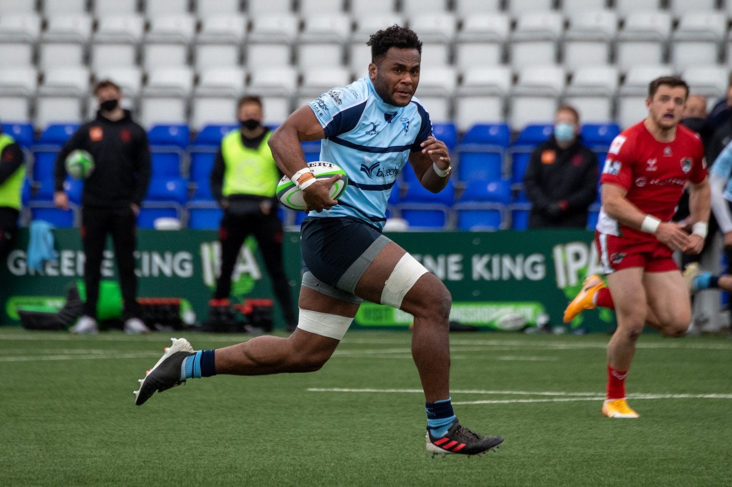 Tui Uru of Northampton Saints on the charge for Bedford Blues