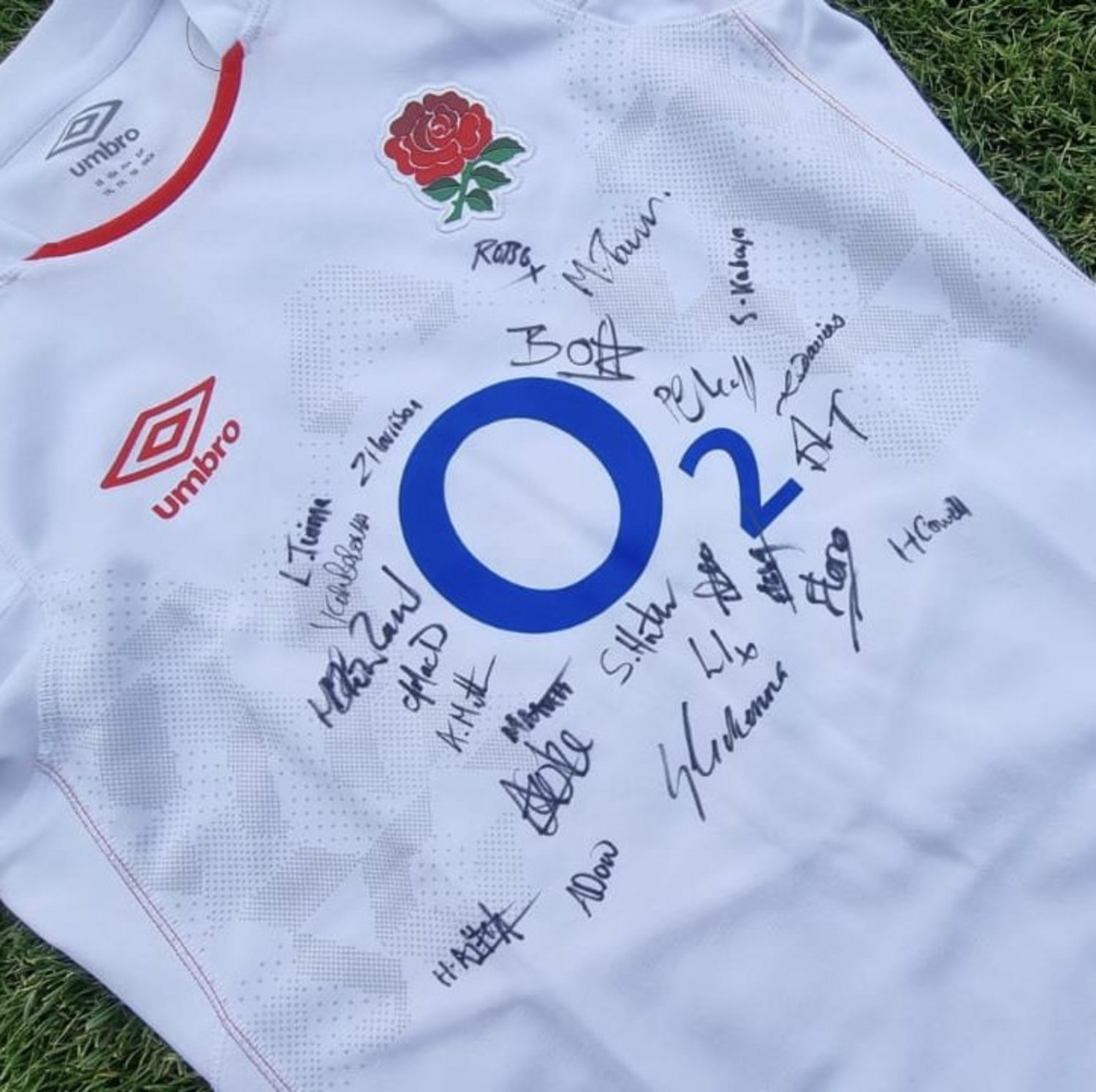 Bid now to be in with a chance of winning a signed Red Roses shirt.