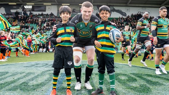 Run out as a mascot with Northampton Saints