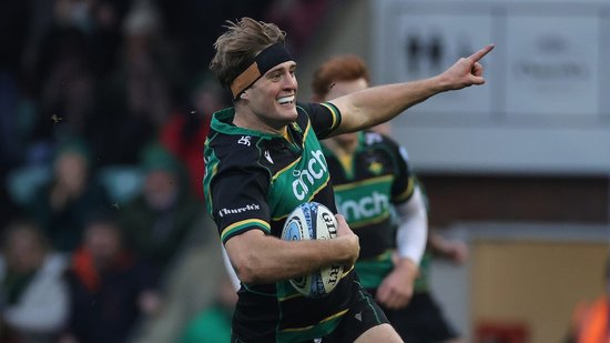 Alex Coles of Northampton Saints scores against Newcastle Falcons.