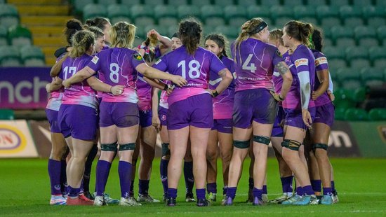 Loughborough Lightning huddle during a game