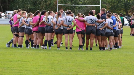 Loughborough Lightning huddle up after defeating Leicester Tigers.