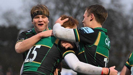 Northampton Saints celebrate scoring a try