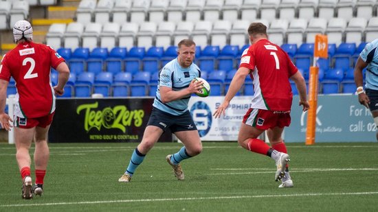 James Fish of Northampton Saints on the charge for Bedford Blues