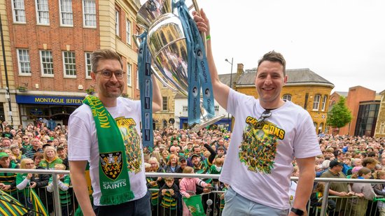 Northampton Saints’ Chief Executive Mark Darbon and Director of Rugby Phil Dowson lift the Gallaher Premiership trophy.