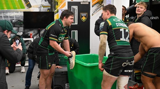 Henry Walker leads the Shoe Army song following his Northampton Saints debut against Newcastle Falcons.