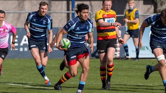 Saints' Connor Tupai on the charge for Bedford Blues