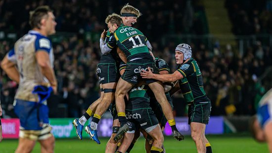 Northampton Saints celebrate scoring a try.