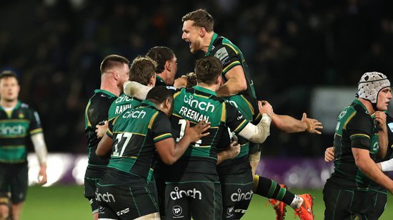 Northampton Saints celebrate a bonus-point win over Bath Rugby.