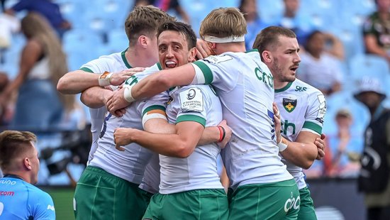 Northampton Saints celebrate scoring a try