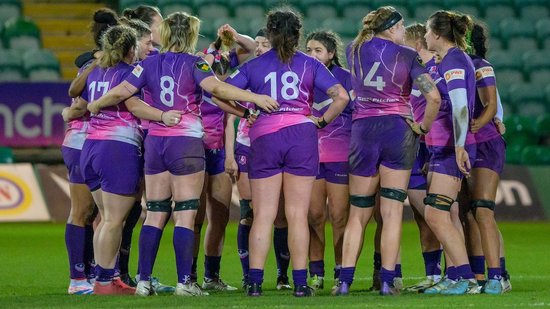 Loughborough Lightning huddle during a game