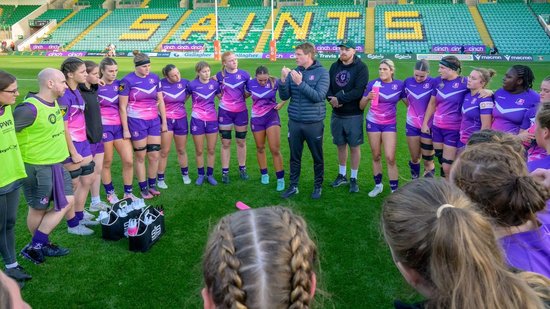 Loughborough Lightning huddle during a game