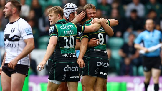 Northampton Saints celebrate scoring a try