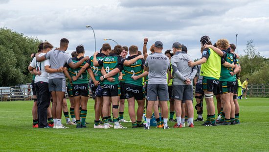 Northampton Saints Under-18s huddle before a game