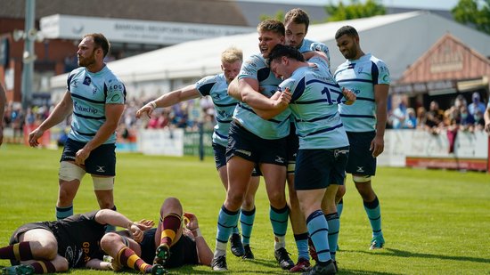 Bedford Blues celebrate sealing their season with a win over Ampthill