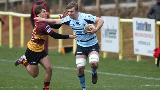 Northampton Saints' Ollie Newman carries for Bedford Blues