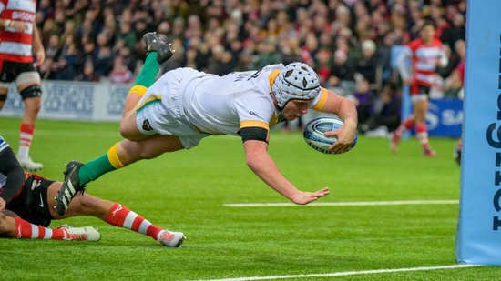 Curtis Langdon scores for Northampton Saints against Gloucester.