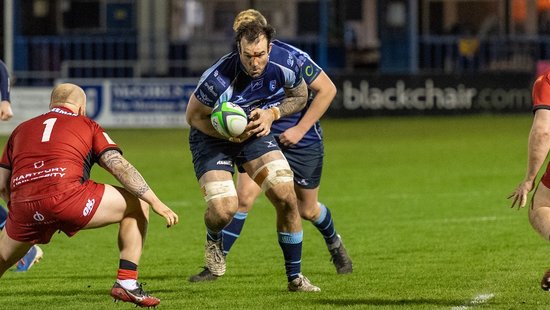 Northampton Saints' Lewis Bean on the charge for Bedford Blues