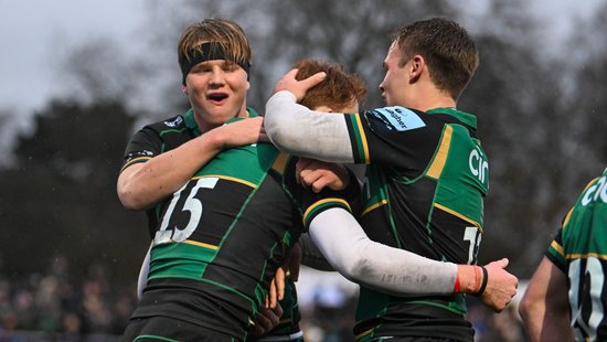 Northampton Saints celebrate scoring a try